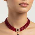 Oriental ruby red necklace – central cabochon and dangling drop
